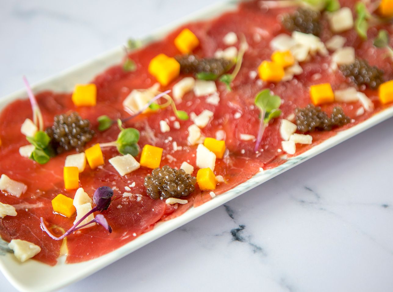 Carpaccio de ternera y Perlas de trufa negra