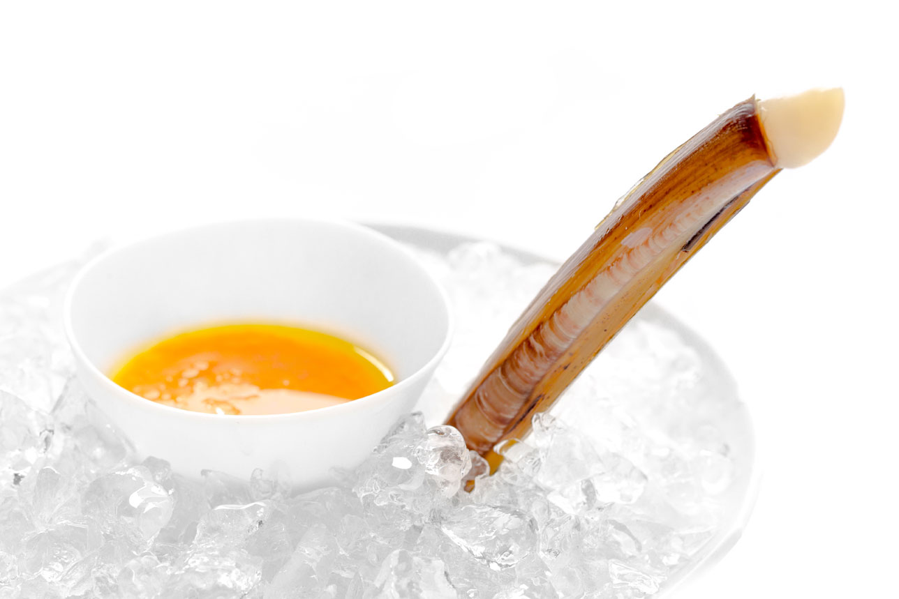 Navaja gallega con refrito de ají amarillo