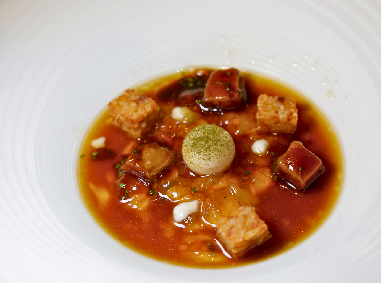 Ternera, arroz y su consomé con cítricos